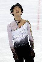 Japan's figure skater Hanyu smiles after free program