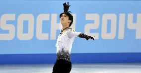 Japan's Hanyu skates in front of Sochi Olympic logo