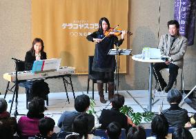 Poet Miyazawa's violin played by relative in Kyoto