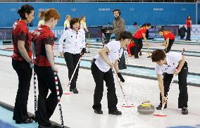 Japan against Canada in women's curling