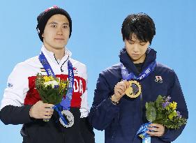 Hanyu, Chan receive medals in Sochi