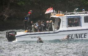 Search continues for 7 Japanese scuba divers missing off Bali