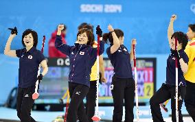 Japan curlers defeat China in Sochi