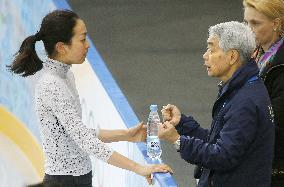 Asada talks with coach in Sochi