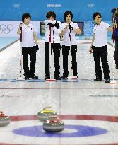 Japan curling players think strategy against Sweden in Sochi