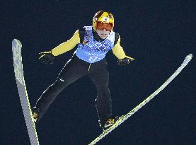 Japan's Kasai competes in team ski jumping in Sochi