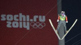Japan's Takeuchi competes in team ski jumping in Sochi