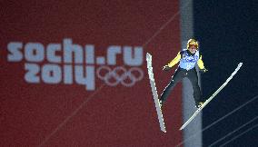 Japan's Kasai competes in team ski jumping in Sochi