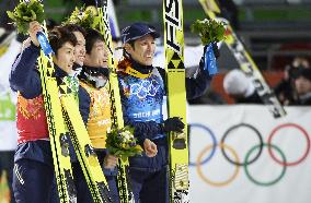 Japan ski jumping team celebrates on winning bronze