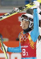 Japan's Shimizu responds to crowd after 2nd jump
