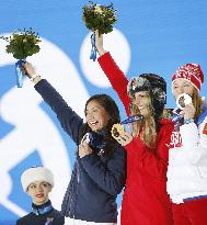 Women's snowboard giant slalom medalists on podium
