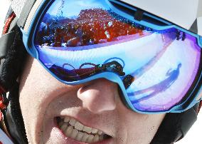 Swiss athlete reacts after men's parallel giant slalom