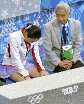 Japan's Asada after women's short program performance