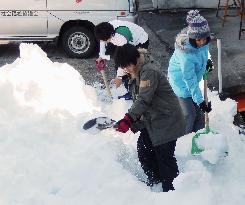 Snow shoveling volunteers