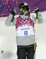 Bronze medalist Onozuka holds up fists in triumph at Sochi