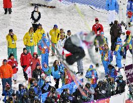 Supporters watch Onozuka fly high in women's ski halfpipe