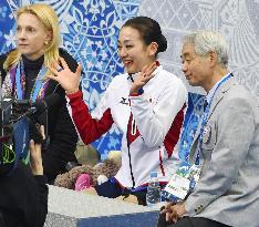 Asada smiles after free program at Sochi