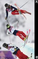 Female freestyle skiers practice halfpipe at Sochi
