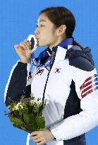 S. Korea's Kim kisses her figure skating silver medal
