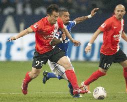 Japan striker Okazaki in action for Mainz against Schalke