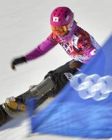 Japan's Takeuchi races in women's snowboard slalom prelim