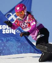 Japan's Takeuchi races in women's snowboard slalom prelim