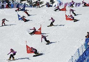 Japan's Takeuchi races in women's snowboard parallel slalom