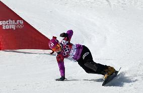Japan's Takeuchi races in women's snowboard parallel slalom