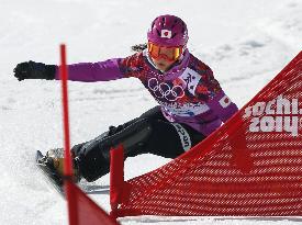 Japan's Takeuchi races in women's snowboard parallel slalom