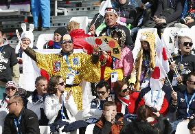 Crowd cheers snowboarder Takeuchi at Sochi Games