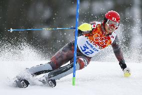 Japan's Sasaki races in men's skiing slalom in Sochi