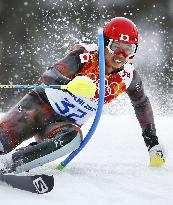 Japan's Sasaki races in men's skiing slalom in Sochi