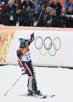 Japan's Yuasa reacts in men's skiing slalom in Sochi