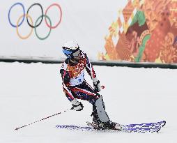 Japan's Yuasa competes in men's skiing slalom in Sochi