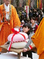 Giant rice cake-lifting festival at Kyoto temple