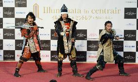 People in feudal warrior costumes promote Kumamoto Castle