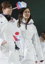 Japan's snowboarder Takeuchi marches at Closing Ceremony
