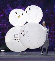 Next Winter Games host's mascot snowmen at Closing Ceremony