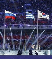 Russian, Greek, S. Korean flags hoisted at Closing Ceremony