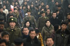 Citizens walk to subway station in Pyongyang, North Korea