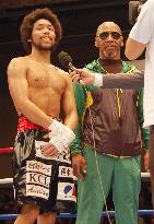 Japan super featherweight champ Naito celebrates with dad