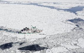 Cruise ship moves through drift ice off Hokkaido