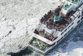 Tourists on ice-breaking cruise ship off Hokkaido