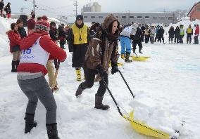 Promoting snow shoveling as sport