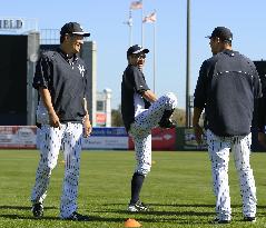 Japanese Yankees chat during preseason training