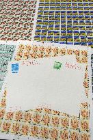 Japan sells new postcards, stamps reflecting sales tax hike