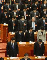 China's Xi, Li bow in silence for Kunming rampage victims
