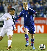 Japan midfielder Honda in action against NZ
