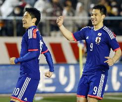 Japan's Kagawa smiles after scoring against New Zealand