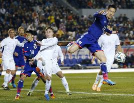 Japan defender Yoshida advances toward goal in game vs. NZ